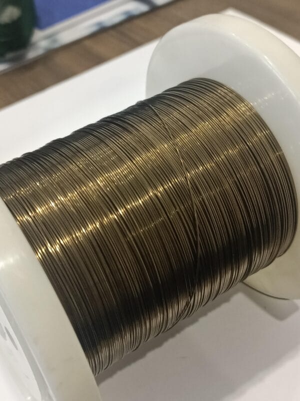 Golden oxidized Nitinol flat wire memory alloy