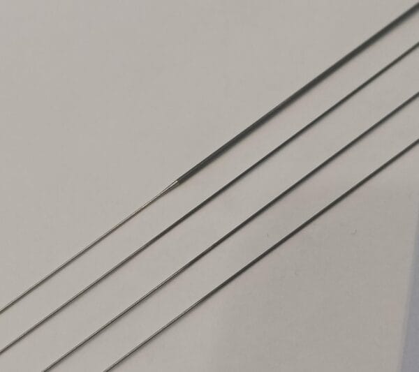 Cutting nitinol wire with ultra-smooth surface for precision medical devices