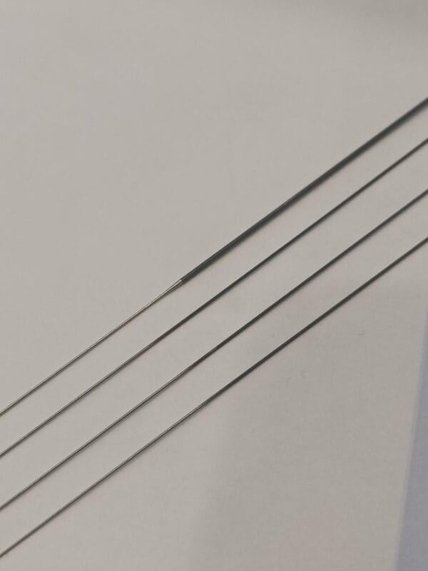 Cutting nitinol wire with ultra-smooth surface for precision medical devices