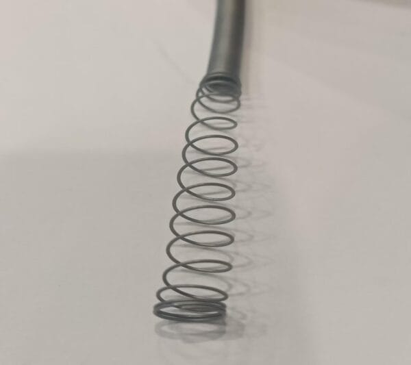 coiled nitinol coil spring showing shape memory effect