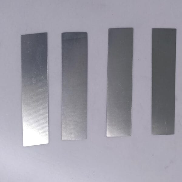 Orthopedic nitinol staple plates with polished finish for surgical fixation