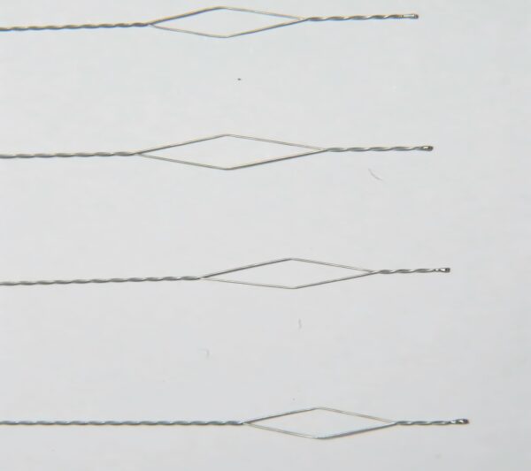 Close-up of medical-grade nitinol cable showing its fine weave and superelastic properties.